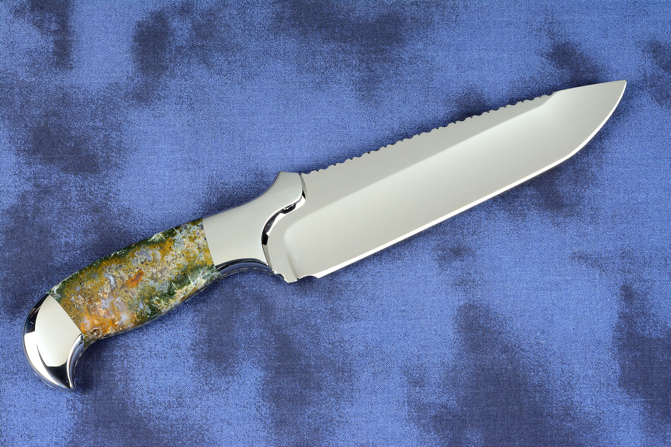 "Axia EL" fine handmade knife obverse side view  in T3 deep cryogenically treated CPM 154CM high mollybdenum powder metal technology martensitic stainless steel blade, 304 stainless steel bolsters, Linda Marie Moss Agate gemstone handle, hand-carved leather shoulder inlaid with green, black ray skin