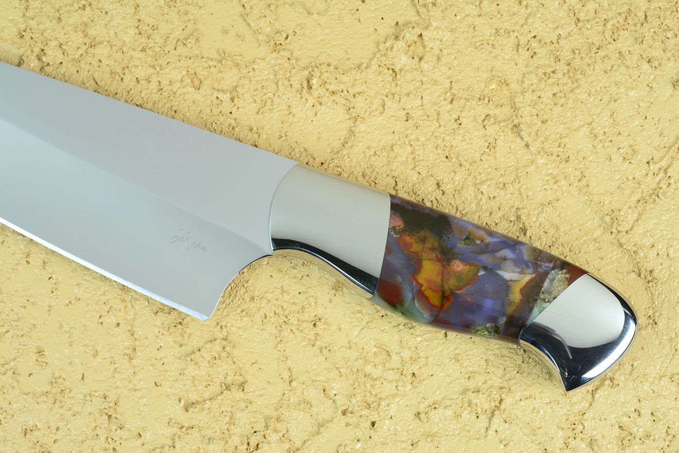 "Corvus," obverse side view in ATS-34 high molybdenum martensitic stainless steel blade, T3 Cryogenically treated, 304 stainless steel bolsters, Majestic Agate gemstone handle, silicone prise "Corvus," obverse side view in ATS-34 high molybdenum martensitic stainless steel blade, T3 Cryogenically treated, 304 stainless steel bolsters, Majestic Agate gemstone handle, silicone prise
