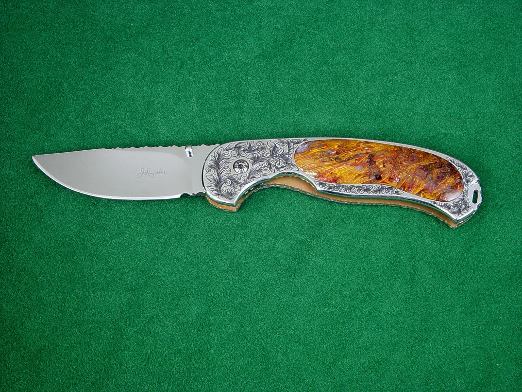 "Izar" linerlock folding knife, obverse side view in 440C high chromium stainless steel blade, hand-engraved 304 stainless steel liners, 6AL4V anodized titanium lockplate, Pietersite Agate gemstone handle, Black Galaxy Granite gemstone case lined with leather "Izar" linerlock folding knife, obverse side view in 440C high chromium stainless steel blade, hand-engraved 304 stainless steel liners, 6AL4V anodized titanium lockplate, Pietersite Agate gemstone handle, Black Galaxy Granite gemstone case lined with leather