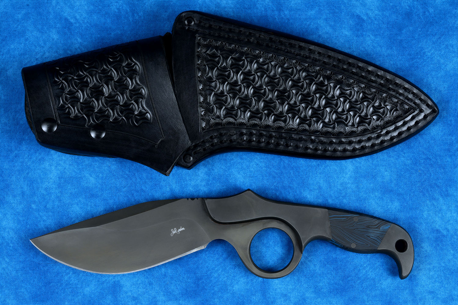 "Kairos" Tactical, Counterterrorism Knife, obverse side, leather sheath view in T3 cryogenically treated 440C high chromium martensitic stainless steel blade, 304 stainless steel bolsters, blue and black G10 fiberglass epoxy composite handle, hybrid tension-locking tab-lock sheath in kydex, anodized aluminium, stainless steel and titanium