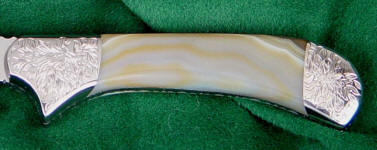 White banded geodic agate gemstone knife handle White banded geodic agate gemstone knife handle