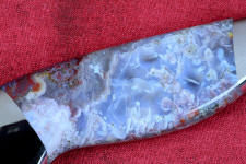 Bay of Fundy agate, 5 power magnification showing intense fossilization of ancient creatures in lavender agate Bay of Fundy agate, 5 power magnification showing intense fossilization of ancient creatures in lavender agate