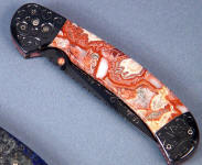 Crazy Lace Agate on blued O-1 linerlcock folding knife Crazy Lace Agate on blued O-1 linerlcock folding knife