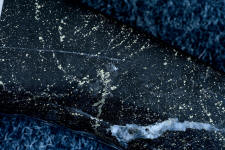 Golden Midnight Agate has streaks of white agate in black hornfels Golden Midnight Agate has streaks of white agate in black hornfels