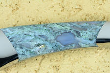 Enlargement of Horse Canyon Plume Agate shows wild mossy patterns and fortification milky agate Enlargement of Horse Canyon Plume Agate shows wild mossy patterns and fortification milky agate