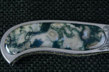Hard and glassy, Indian Green Moss Agate with bits of crystal inclusions and hard cryptocrystalline quartz takes a glassy polish Hard and glassy, Indian Green Moss Agate with bits of crystal inclusions and hard cryptocrystalline quartz takes a glassy polish
