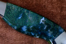 Translucent, clear, and mossy green areas of Indian green moss agate gemstone knife handle Translucent, clear, and mossy green areas of Indian green moss agate gemstone knife handle