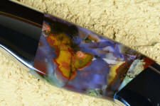 5 power enlargement of Majestic Agate without reflector above specimin shows intense colors deep within the gemstone 5 power enlargement of Majestic Agate without reflector above specimin shows intense colors deep within the gemstone