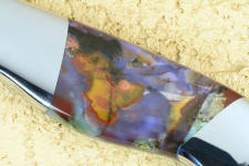 Majestic Agate has purples, ochre, white, reds, and even greens Majestic Agate has purples, ochre, white, reds, and even greens