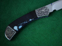 Black and white moss agate gemstone knife handle is tough and hard on this folding knife Black and white moss agate gemstone knife handle is tough and hard on this folding knife
