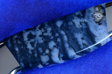 Night leapord agate magnification showing intricate crystalline details and banding Night leapord agate magnification showing intricate crystalline details and banding