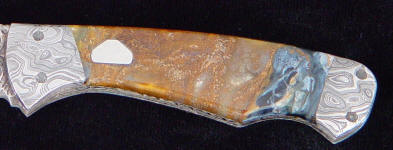 Piedersite Agate from Namibia, Africa has irregular brecciated masses of fibers Piedersite Agate from Namibia, Africa has irregular brecciated masses of fibers