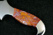 Rooster Tail Agate is bright and colorful, a cryptocrystalline quartz Rooster Tail Agate is bright and colorful, a cryptocrystalline quartz