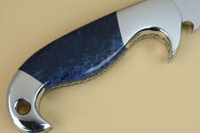 Dumortierite can be very dark blue, and is the hardest, toughest naturally blue gemstone appllicable for knife handles Dumortierite can be very dark blue, and is the hardest, toughest naturally blue gemstone appllicable for knife handles