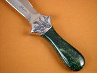 Alaskan nephrite jade gemstone on full tang dagger handle Alaskan nephrite jade gemstone on full tang dagger handle