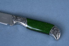 California Nephrite Jade gemstone is extremely tough and durable. Here, it's paired with black nephrite jade in a doublet mount California Nephrite Jade gemstone is extremely tough and durable. Here, it's paired with black nephrite jade in a doublet mount