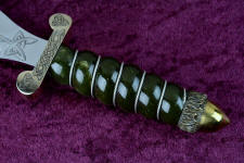 Wyoming nephrite jade gemstone in a wire-wrapped handle Wyoming nephrite jade gemstone in a wire-wrapped handle