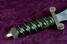 Nephrite jade gemstone in a tough, hand-carved hidden tang dagger handle wrapped with sterling silver Nephrite jade gemstone in a tough, hand-carved hidden tang dagger handle wrapped with sterling silver