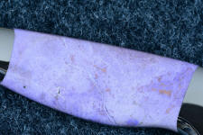 Turkish jade is naturallly purple, and a mixture of several different types of stone, but mainly jade Turkish jade is naturallly purple, and a mixture of several different types of stone, but mainly jade