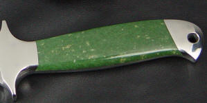 Siberian Jade is tough enough for use on this combat grade knife handle Siberian Jade is tough enough for use on this combat grade knife handle